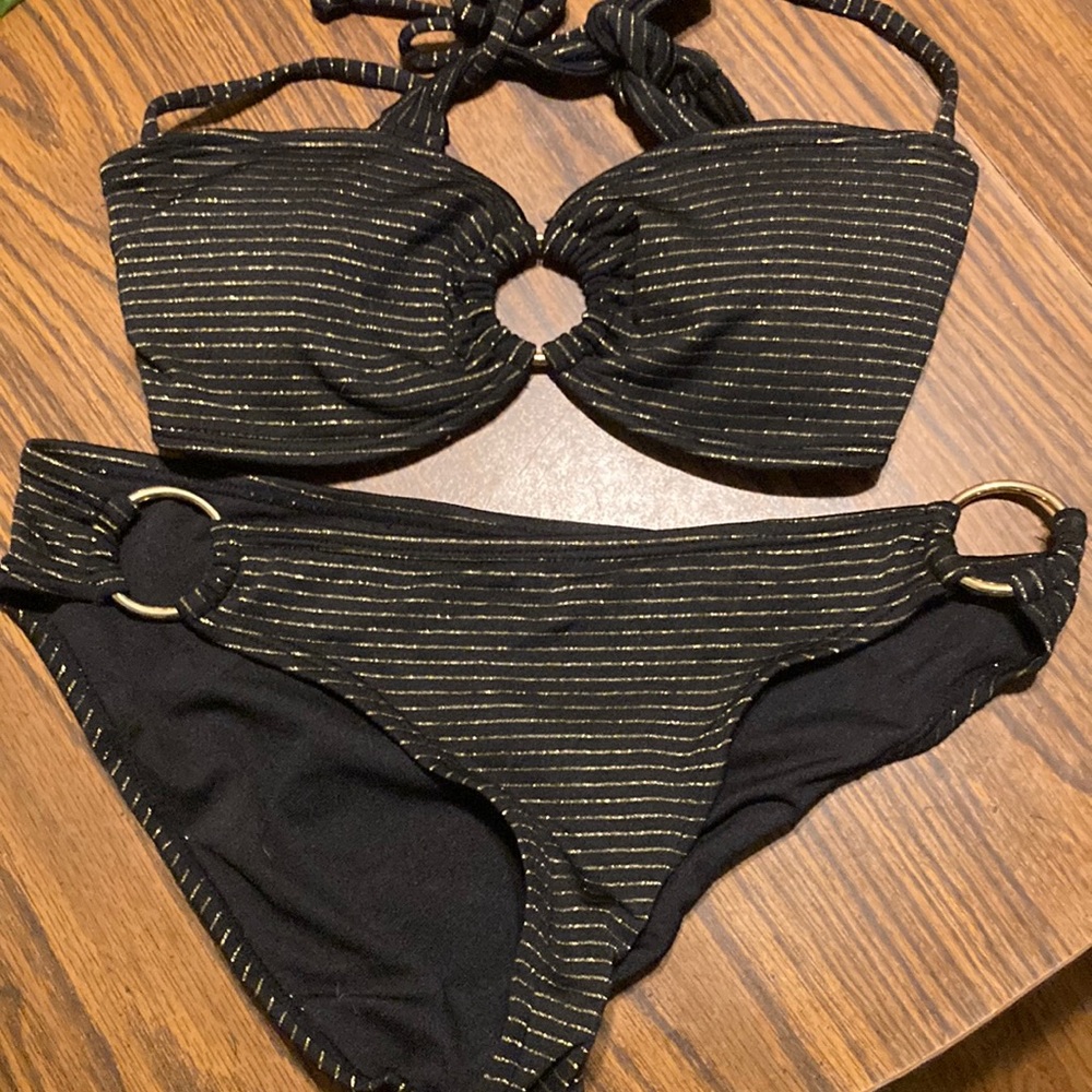 Woman’s joe boxer extra small black and gold striped lined bikini